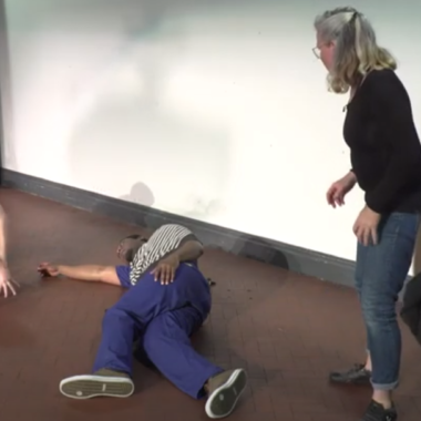 Actors on stage as part of the NHS training in Bristol